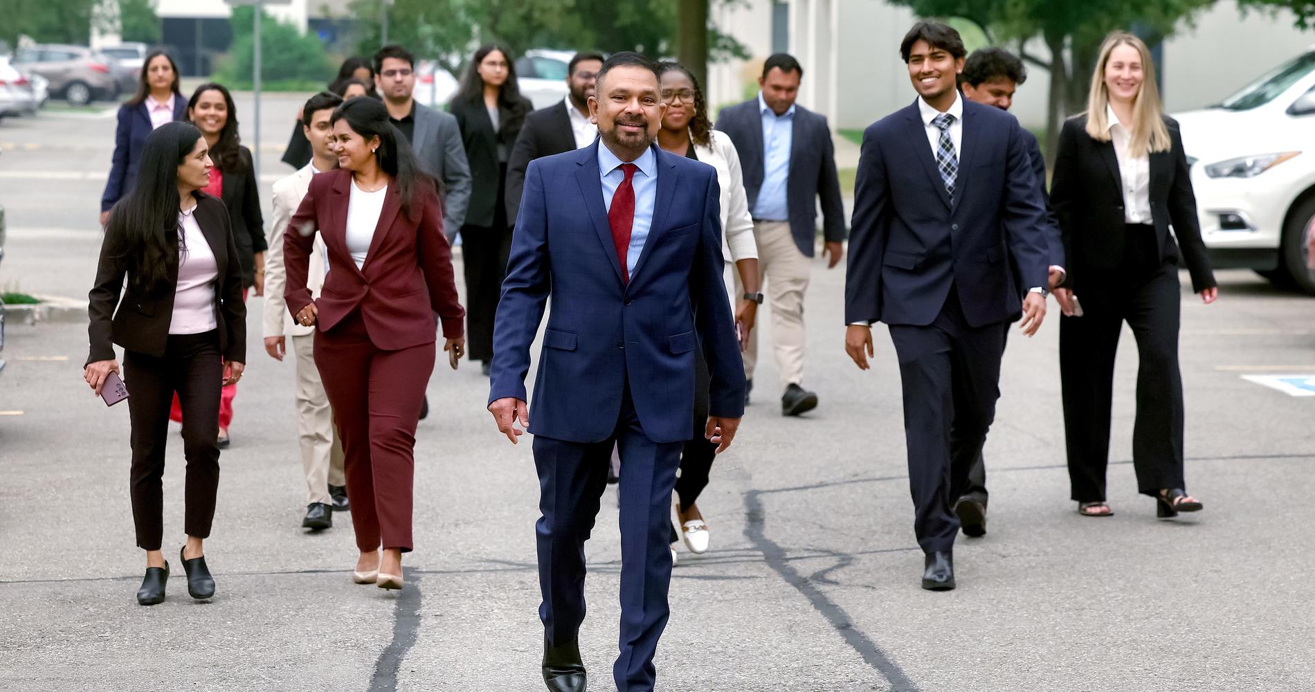 Novamodus consultants walking together outside the office